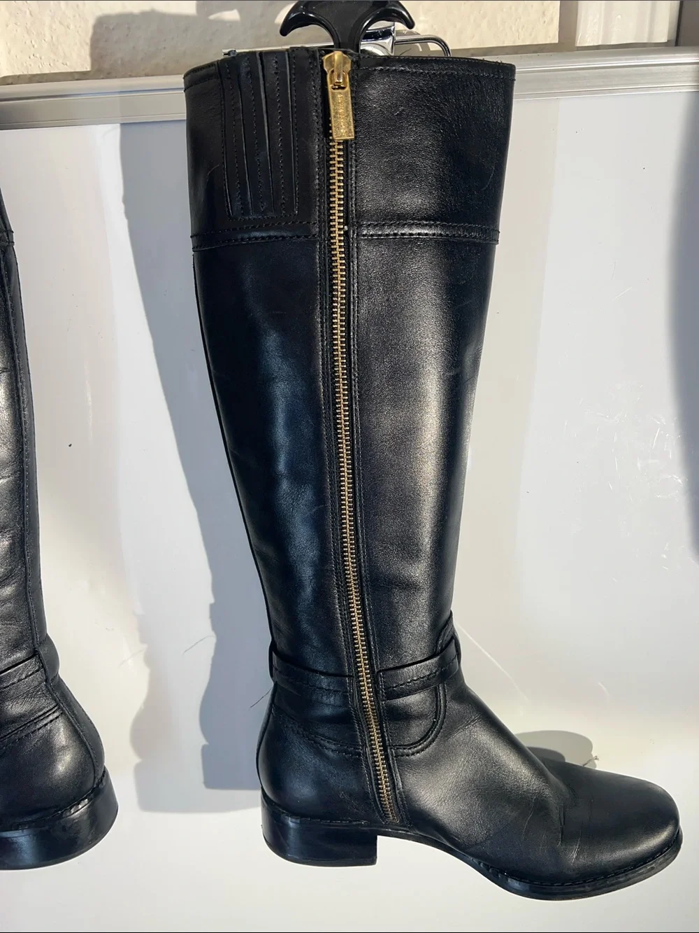 Knee-high leather boots with MK logo